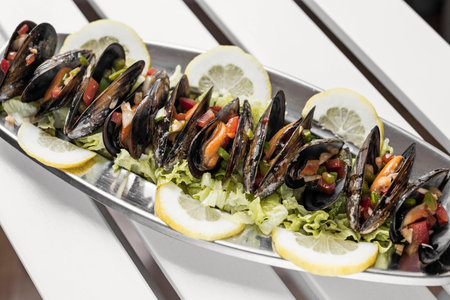 steamed mussels with pico de gallo tapas portion in barcelona