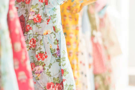 floral pattern young girl dresses in shopの写真素材