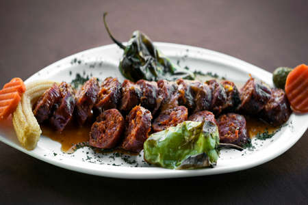 Portuguese spanish roast bbq grilled chourico chorizo spicy sausage tapasの写真素材