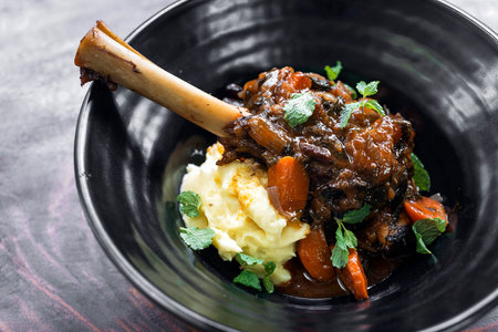 lamb and vegetable stew with mashed potatoの写真素材