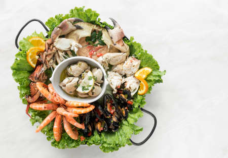 mixed fresh seafood gourmet platter on spanish restaurant tableの写真素材