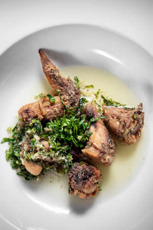 Portuguese spicy marinated deep fried chicken with garlic coriander sauceの写真素材