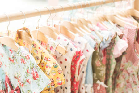 floral pattern young girl dresses in shopの写真素材