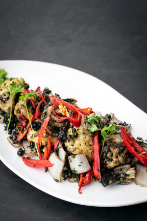 stir fry fresh spicy squid with kampot pepper in cambodiaの写真素材