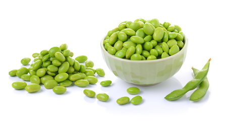 Edamame soy beans in bowls on white background