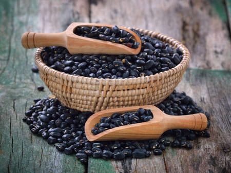 black bean in the spoon on tableの写真素材