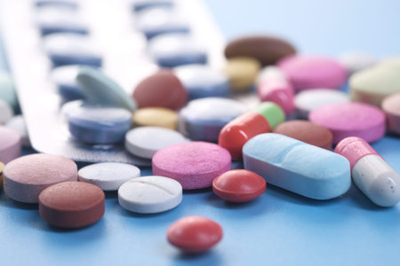 selective focus. Close up of many colorful pills and capsules .