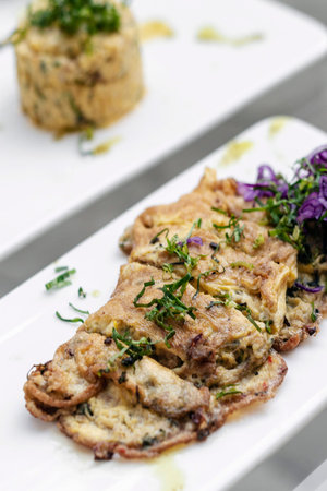 spicy chorizo and mushroom omelette with red cabbage salad tapas snack in lisbon restaurant