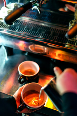 making espresso coffee close up detail with modern cafe machineの写真素材