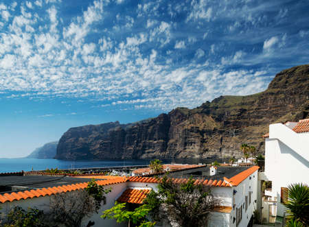 los gigantes cliffs and village in south tenerife island spainの写真素材