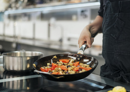 chef with apron cooking dish kitchen. Resolution and high quality beautiful photoの写真素材