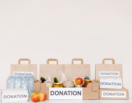 front view donation boxes bags with copy spaceの写真素材
