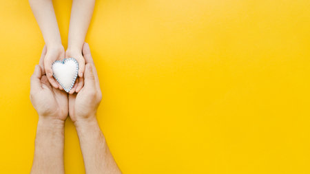 people holding white heart hands with copy space . Resolution and high quality beautiful photoの写真素材