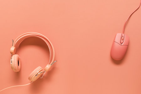 headphones mouse orange background. Resolution and high quality beautiful photoの写真素材