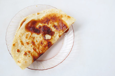 homemade roti chapati on table
