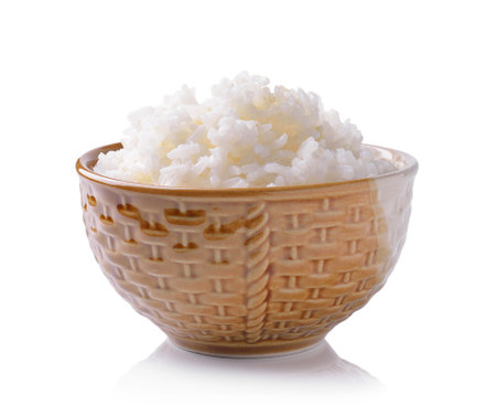 Rice in a bowl isolated on a white backgroundの写真素材