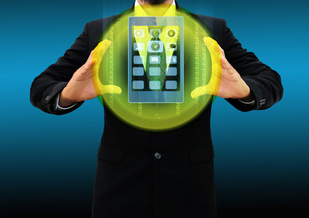 businessman holding mobile phone