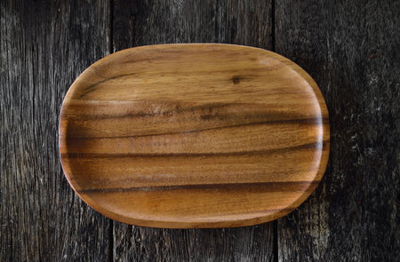 wood plate on woodenの写真素材