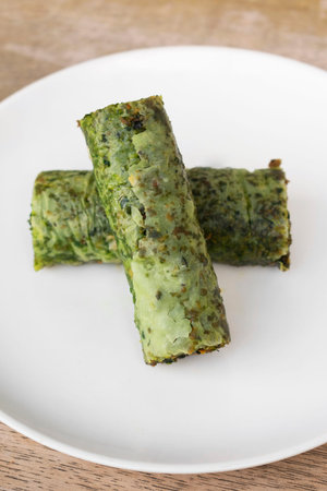 Fresh homemade pistachio roll Baklava middle eastern sweet dessert pastry cakes in Istanbul turkeyの写真素材