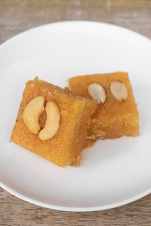 Fresh homemade Namoura middle eastern sweet dessert semolina pastry cakes in Istanbul Turkey