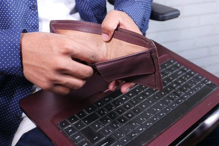 Man hand open an empty wallet with copy space