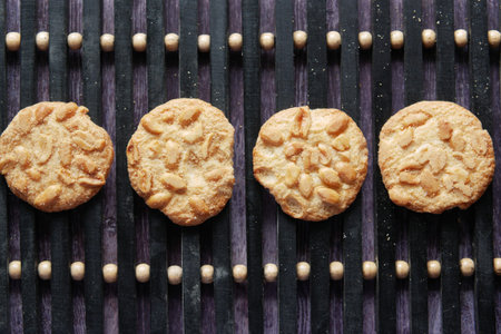 close up of sweet cookies on wooden table .