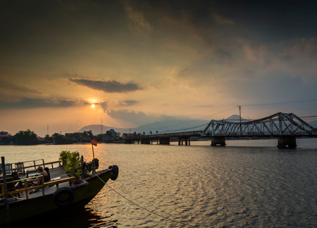 landmark old bridge and river at sunset in kampot cambodiaの写真素材