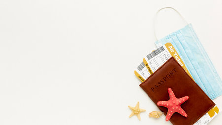 flat lay passport mask arrangementの写真素材