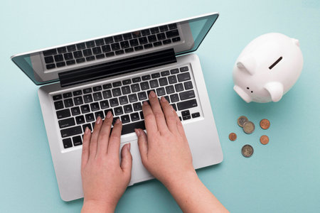 top view finance elements with white piggy bankの写真素材