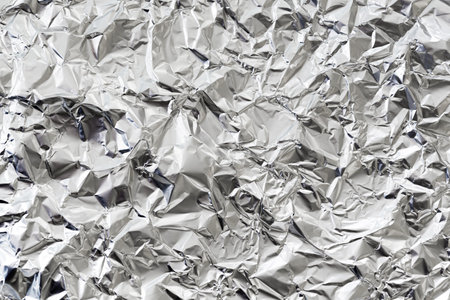 crumpled silver aluminium foil background. Resolution and high quality beautiful photoの写真素材