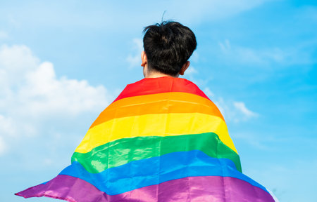 Abstract silhouette of gay man on shoulder is lgbt flag