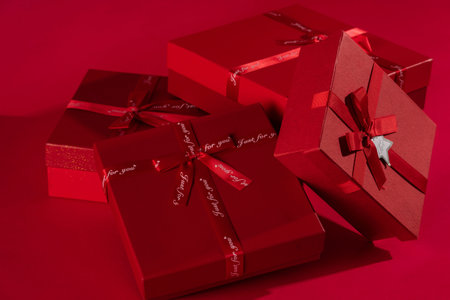 Red gift boxes on a red background