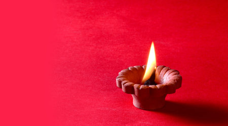 Clay diya lamps lit during diwali celebration. Greetings Card Design Indian Hindu Light Festival...