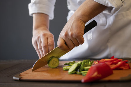 close up hands cutting cucumber. Resolution and high quality beautiful photoの写真素材