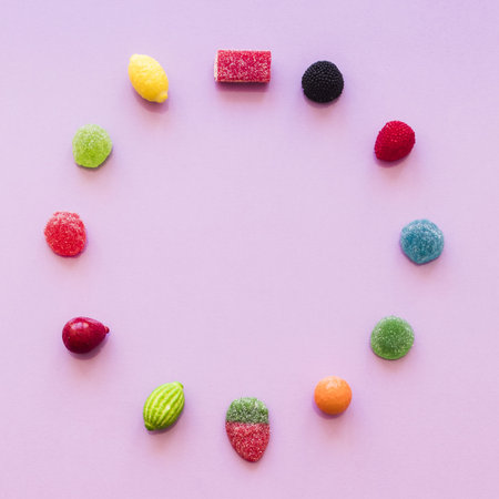 circle made with sugar jelly candies pink background. Resolution and high quality beautiful photoの写真素材