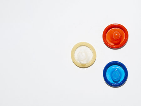 above view unwrapped condoms on white background. Resolution and high quality beautiful photo