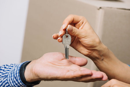 crop people exchanging with keys. Resolution and high quality beautiful photo