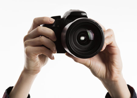 hands holding camera. High quality beautiful photo concept
