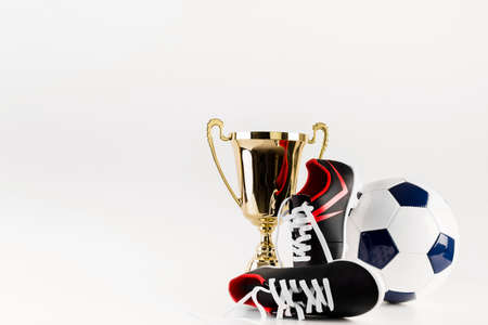 football composition with shoes ball trophyの写真素材