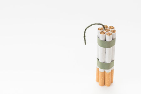 bunch cigarette with wick white backdrop