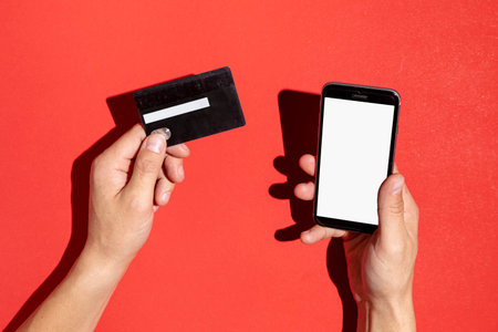 hands holding credit card phone mock up