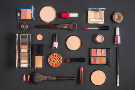 different type makeup products black backdropの写真素材