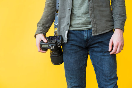 grapher standing with cameraの写真素材