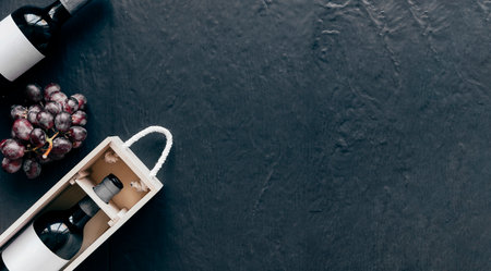 grape near wine bottlesの写真素材