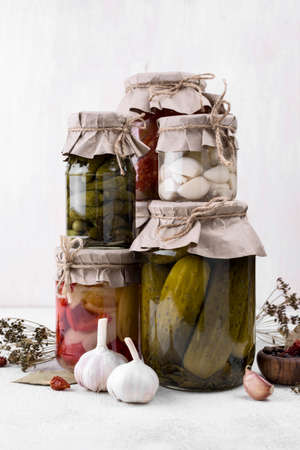 jars arrangement with picked vegetablesの写真素材