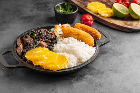 high angle tasty brazilian dish with orangeの写真素材