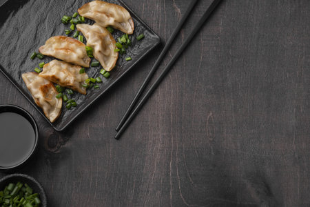flat lay asian dumplings dish slate with copy space. High quality beautiful photo concept