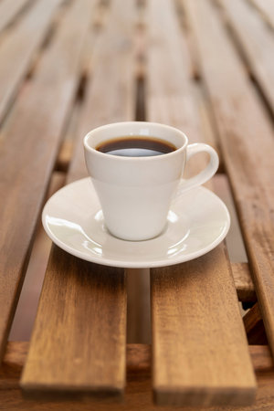 minimalistic coffee cup wooden table