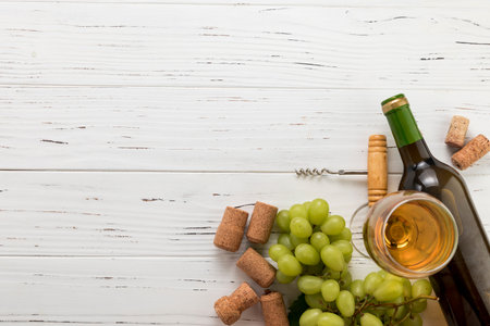 top view bottle wine with glass bunch grapes