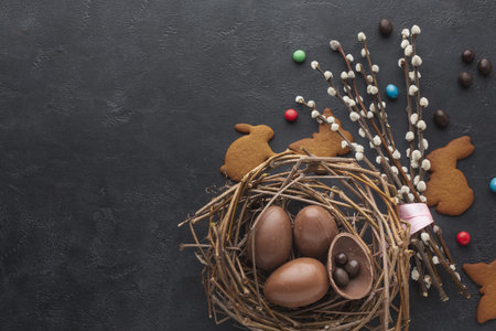 top view chocolate easter eggs nest with candy copy space. Resolution and high quality beautiful...